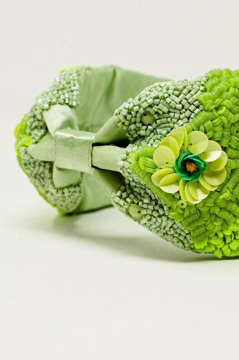 q2 women s hat one size green chunky headband with embellished green flowers chunky headband with embellished green flowers 9305913 55054 2305901321017 39226999374082