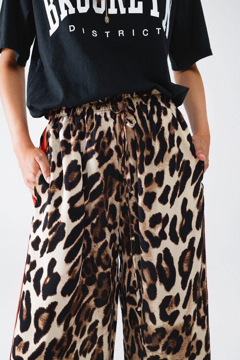 q2 women s pants trousers leopard straight pants with red stripes down the sides 41437005447426